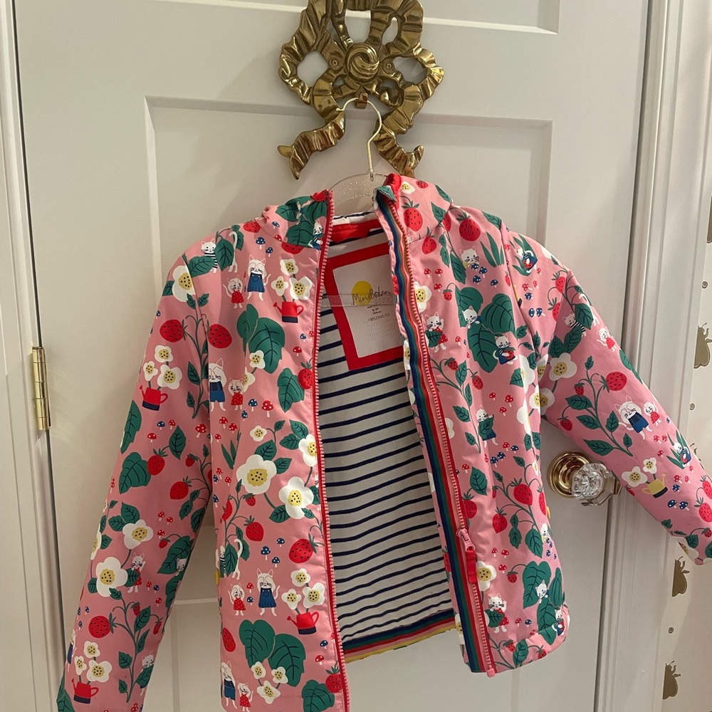 Mini Boden pink floral water resistant hooded jacket. 
Girls size 8-9Y.